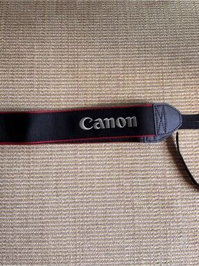 Canon Black Neck Strap with Red Trim and White Logo